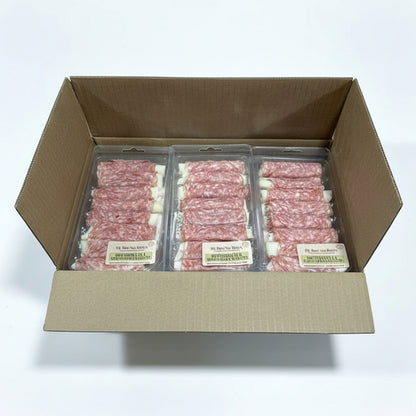 Packaged salami and mozzarella sticks in a cardboard box