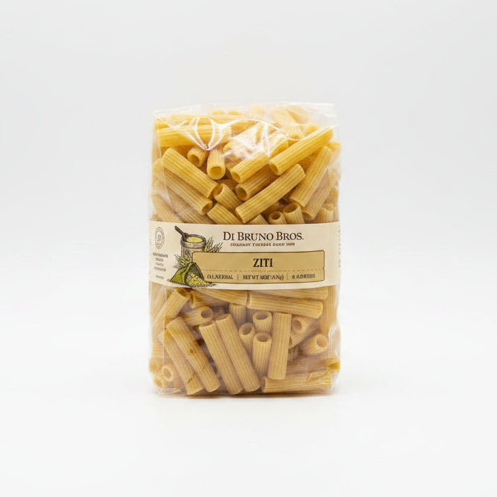 Packaged ziti pasta with Di Bruno Bros label on a black surface.