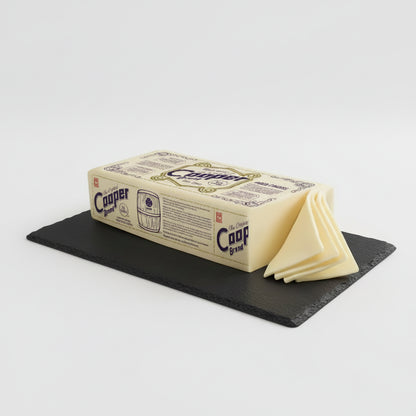 Butter stick with 'Cooper Brand' packaging on a white background