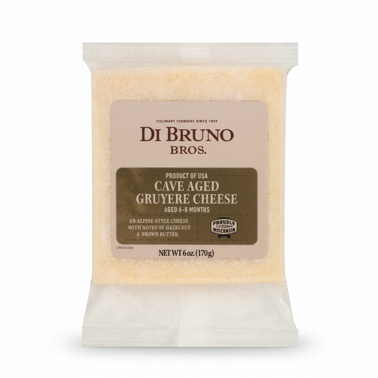 Package of Di Bruno Bros. Cave Aged Gruyère Cheese on a white background