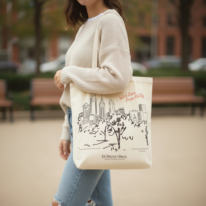 Tote bag with black and white design on a marble surface